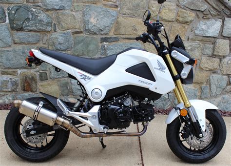 Up for sale is a Honda grom I got in a trade deal Has 6500 miles Color pearl Him. . Grom for sale